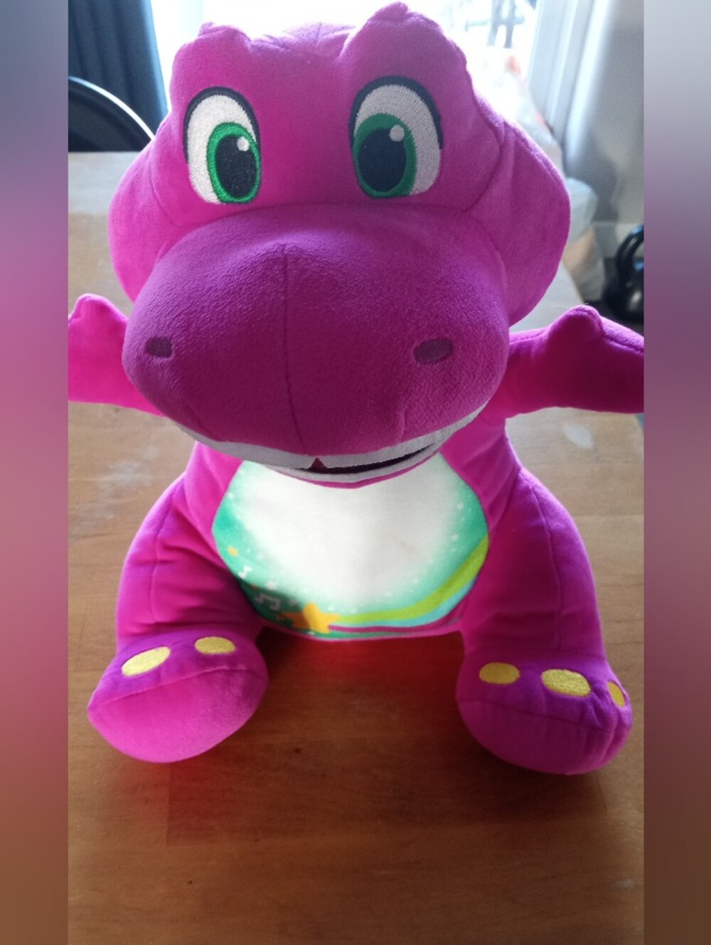 Fisher-Price Bright Pink Dinosaur Plush with Green Eyes